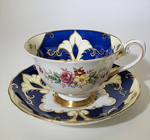 Tuscan Royal Blue/ Cream/ Floral/Gold Fine English Bone China Teacup and Saucer Set. c.1947-1966