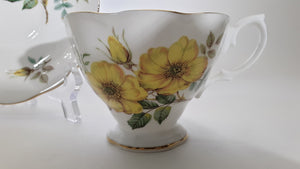 Royal Albert English Bone China Yellow Flowers Teacup and Saucer Set. c.1960-1970's