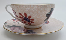 Wedgwood Cuckoo Collection Fine Bone China Peach Teacup and Saucer Set.