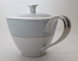 Noritake Laureate Pastel Blue Fine Porcelain 8-Piece Teapot, Teacup, Creamer Set.