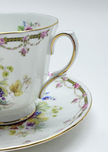 Duchess London Collection Floral, Swag and Basket English Bone China Tea Cup and Saucer Set.