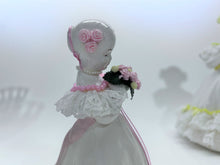 Lace and Ceramic Girls with Yellow and Pink Flowers Figurine Pair