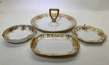 Noritake Christmas Ball Hand Painted Porcelain 4-Piece Serving Plate Set, c.1912-1991.