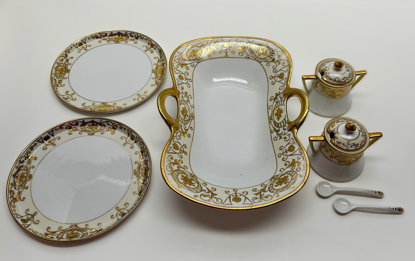 Noritake Christmas Ball Hand Painted Porcelain Asparagus/Serving Trays, and Mustard Jars with Spoons Collection,  c.1912-1930.