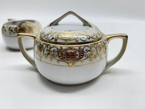 Noritake Christmas Ball Porcelain Hand Painted Teapot, Sugar Bowl, Creamer and Two Cup Set, c.1918-1930