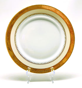 Charles Field Haviland 45-Piece Gold and Cream Rimmed Dinnerware for Seven to Ten.