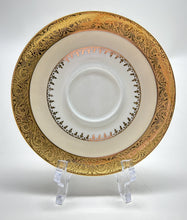 Charles Field Haviland 55-Piece Gold and Cream Rimmed Dinnerware for Seven to Ten.