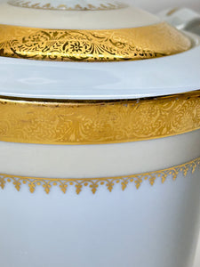 Charles Field Haviland 55-Piece Gold and Cream Rimmed Dinnerware for Seven to Ten.