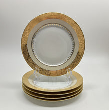 Charles Field Haviland 55-Piece Gold and Cream Rimmed Dinnerware for Seven to Ten.