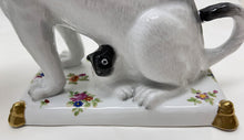 Chelsea House Porcelain Pugs with Nursing Pup Figurine Pair.