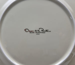 Oscar De La Renta Twilight Bouquet 40-Piece Ivory and Floral Fine China Dinnerware Collection For Eight.