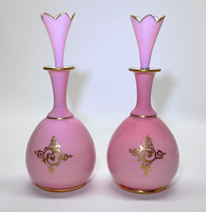 Pink Glass Vanity Perfume Bottle Pair w/ Crown Stoppers.