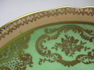 Paragon Powder Green and Gold/ Floral Bone China Teacup and Saucer Set. ENGLAND. c.1939-1949