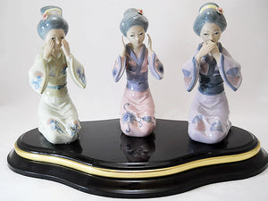 Porcelain See/ Hear/Speak No Evil Geisha Figurines on a Centerpiece Black Platform Base