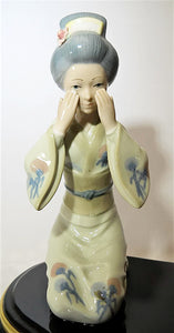 Porcelain See/ Hear/Speak No Evil Geisha Figurines on a Centerpiece Black Platform Base