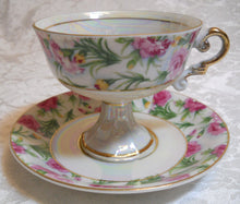 Royal Crown Lusterware Floral Pedestal Teacup/ Saucer Set