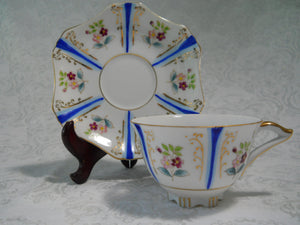 Ucagco Hand Painted Blue Stripes and Floral on White Porcelain Cup/Saucer c.1950's