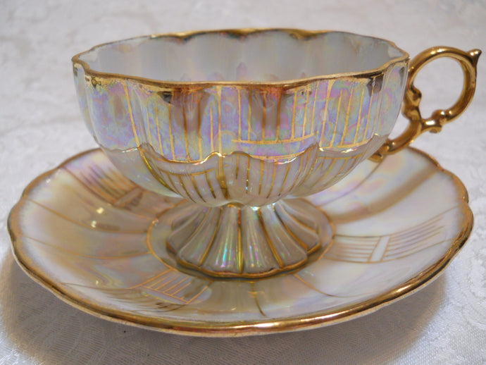 Royal Sealy Opalescent Scalloped Mother of Pearl/ Gold Teacup and Saucer.  