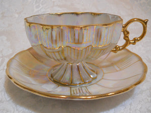 Royal Sealy Opalescent Scalloped Mother of Pearl/ Gold Teacup and Saucer.  