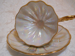 Royal Sealy Opalescent Scalloped Mother of Pearl/ Gold Teacup and Saucer.  