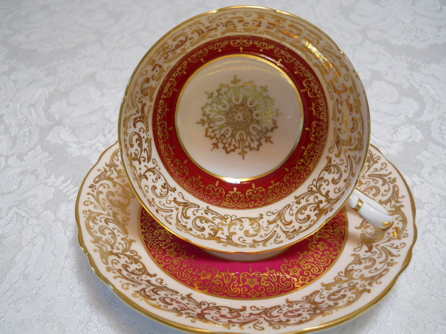 Paragon By Appointment Cranberry and Gold Filigree Tea Cup/Saucer c.1950-60