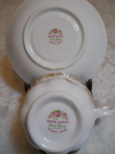 Royal Albert England Dimity Rose Teacup/ Saucer with Floral Gold Trim, PLUS Four Bread and Butter Dishes.