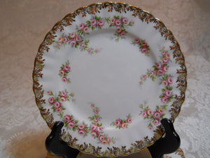 Royal Albert England Dimity Rose with Floral Gold Trim and Four Bread and Butter Dishes. DISCONTINUED