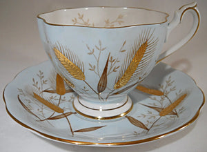 Queen Anne England Fine Bone China Light Blue and Encrusted Gold Wheat Teacup and Saucer Set.