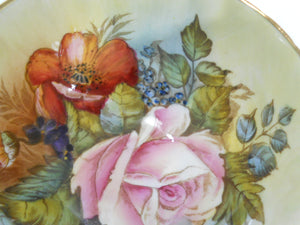 Aynsley J.A. Bailey Signed Turquoise and Pink Cabbage Rose Floral Tea Cup and Saucer Collection.