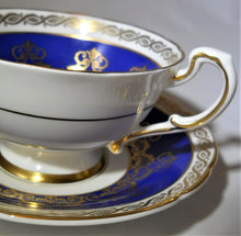 Paragon By Appointment Cobalt Blue and Gold Bone China Teacup and Saucer. England