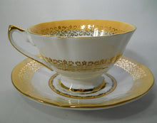 Elizabethan Versailles Yellow/ Gold/ Floral Fine Bone China Tea Cup and Saucer Set. England