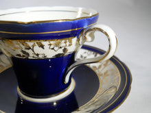 Aynsley Cobalt Blue and Cream with Gold Trim Bone China Teacup/Saucer Set, England, c.1934.