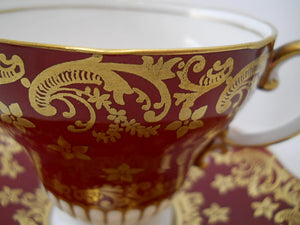 EB Foley England Maroon and Gold Gilt Corset Shaped Bone China Teacup and Saucer Pair. 1948-1963.