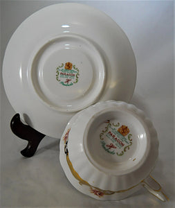 Paragon England Pembroke Maroon and Yellow Bone China Teacup/ Saucer Sets (2), 1957-1960.