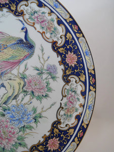 Toyo Japan 10" Decorative Porcelain Plate with Garden Peacocks and Navy/ Floral and Gold Detail.