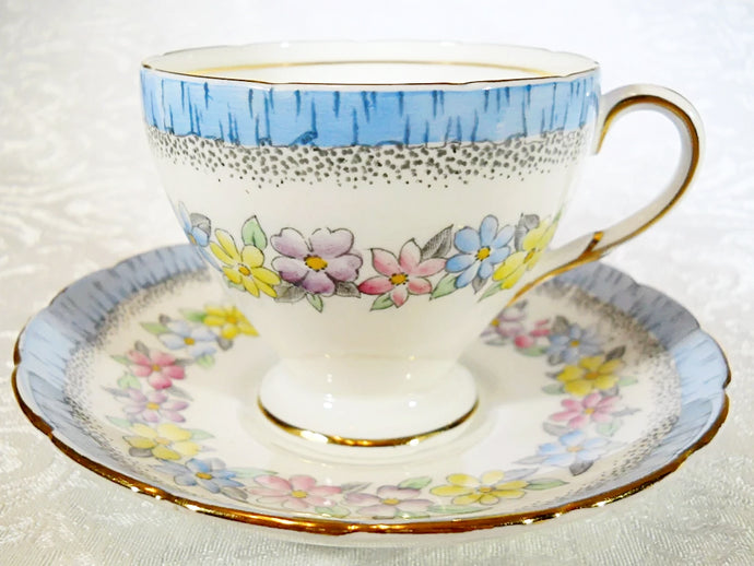EB Foley England Pastel floral and Blue Border Bone China Tea Cup/ Saucer Set