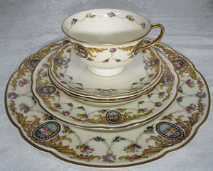 H & Co Heinrich Double Handle Ivory and Gold Coffee, Tea Cup, and Saucer